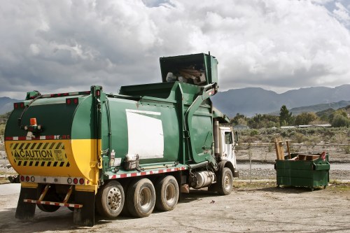 Workers managing construction waste
