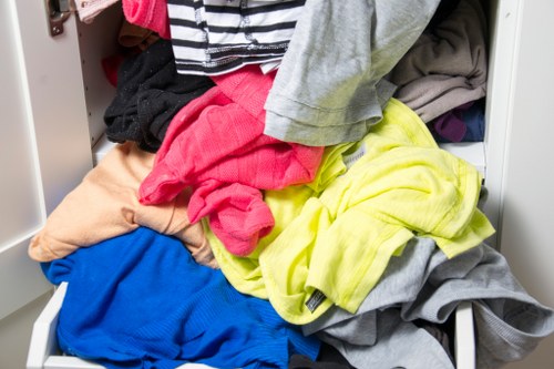 Auditor speaking with workers during a supply chain inspection in Chingford